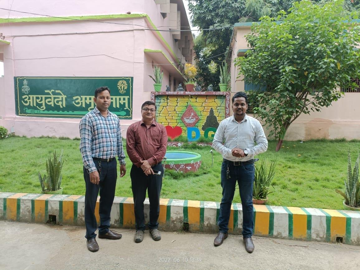 The campus garden and Ayurvedo Amritanam signage
